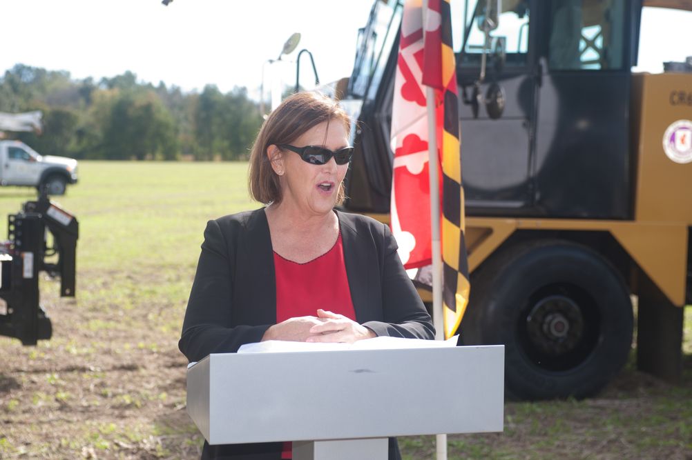Woman speaking at podium