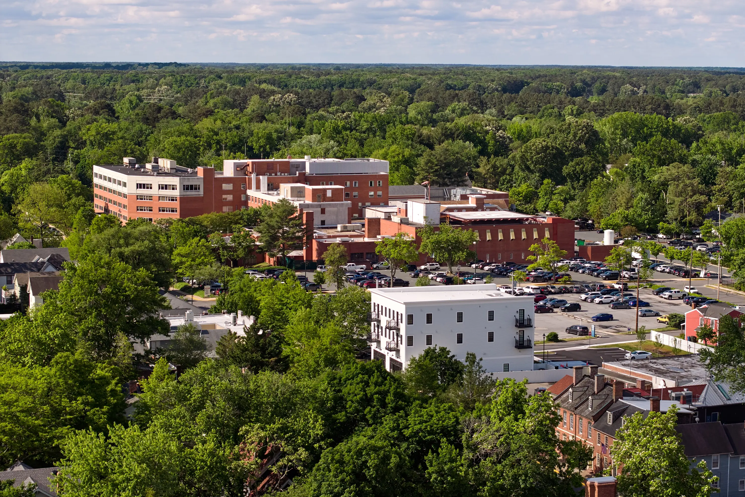 An aerial photo of a business and its parking lot
